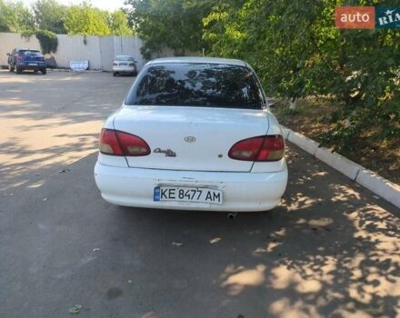 Білий Кіа Авелла, об'ємом двигуна 1.5 л та пробігом 322 тис. км за 1800 $, фото 2 на Automoto.ua