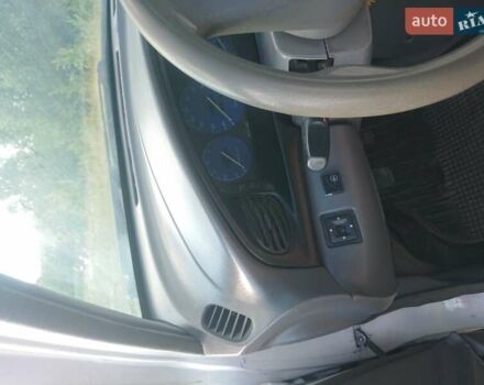 Белый Киа Авелла, объемом двигателя 1.5 л и пробегом 310 тыс. км за 2150 $, фото 3 на Automoto.ua