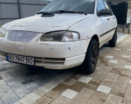 Белый Киа Авелла, объемом двигателя 1.5 л и пробегом 300 тыс. км за 1500 $, фото 1 на Automoto.ua