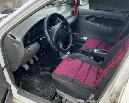 Белый Киа Авелла, объемом двигателя 1.5 л и пробегом 300 тыс. км за 1500 $, фото 5 на Automoto.ua