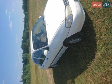 Белый Киа Авелла, объемом двигателя 1.5 л и пробегом 310 тыс. км за 2150 $, фото 1 на Automoto.ua