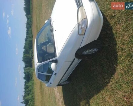 Белый Киа Авелла, объемом двигателя 1.5 л и пробегом 310 тыс. км за 2150 $, фото 1 на Automoto.ua