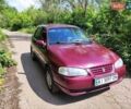 Красный Киа Авелла, объемом двигателя 1.5 л и пробегом 186 тыс. км за 1699 $, фото 1 на Automoto.ua