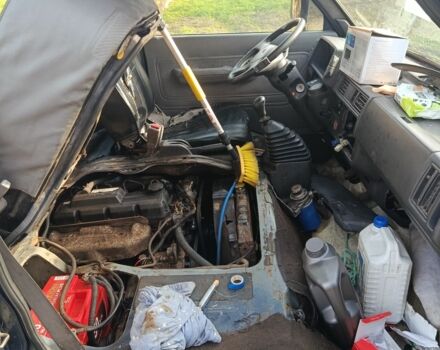 Синій Кіа Беста, об'ємом двигуна 2 л та пробігом 280 тис. км за 979 $, фото 1 на Automoto.ua