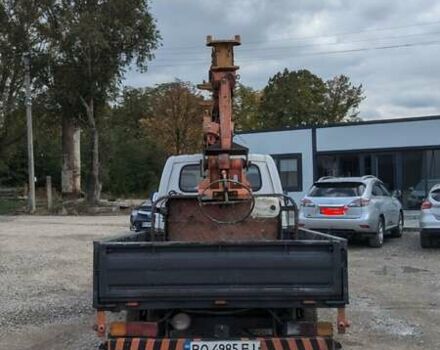 Білий Кіа Бонго, об'ємом двигуна 2.48 л та пробігом 220 тис. км за 25000 $, фото 2 на Automoto.ua