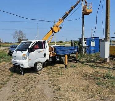 Белый Киа Бонго, объемом двигателя 2.9 л и пробегом 208 тыс. км за 20000 $, фото 1 на Automoto.ua