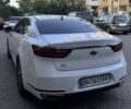Белый Киа Каденза, объемом двигателя 3 л и пробегом 216 тыс. км за 15000 $, фото 1 на Automoto.ua
