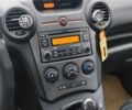 Кіа Каренс 2007 у Хмельницькому на Automoto.ua Білий Кіа Каренс, об'ємом двигуна 2 л та пробігом 250 тис. км за 5500 $, фото 4 на Automoto.ua