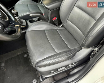 Белый Киа Каренс, объемом двигателя 1.7 л и пробегом 196 тыс. км за 11974 $, фото 24 на Automoto.ua