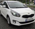 Белый Киа Каренс, объемом двигателя 1.69 л и пробегом 299 тыс. км за 9900 $, фото 1 на Automoto.ua