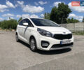 Белый Киа Каренс, объемом двигателя 2 л и пробегом 221 тыс. км за 11800 $, фото 1 на Automoto.ua