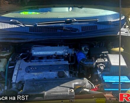 Бежевый Киа Каренс, объемом двигателя 1.8 л и пробегом 338 тыс. км за 3000 $, фото 2 на Automoto.ua