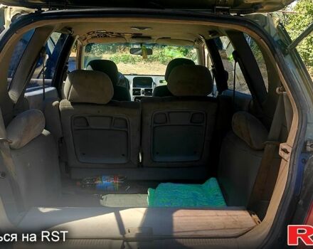 Бежевый Киа Каренс, объемом двигателя 1.8 л и пробегом 338 тыс. км за 3000 $, фото 1 на Automoto.ua