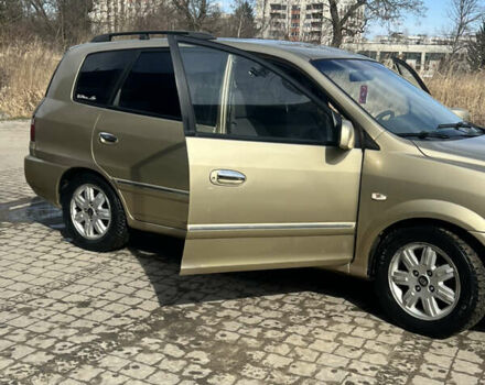 Бежевый Киа Каренс, объемом двигателя 1.79 л и пробегом 299 тыс. км за 3199 $, фото 6 на Automoto.ua