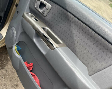 Бежевый Киа Каренс, объемом двигателя 1.79 л и пробегом 299 тыс. км за 3199 $, фото 8 на Automoto.ua