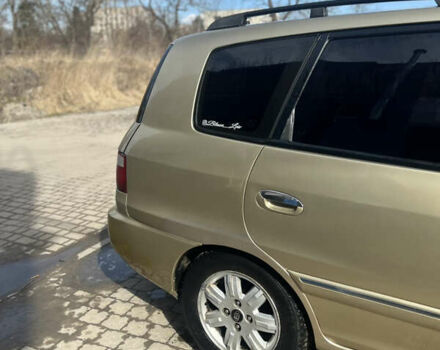 Бежевый Киа Каренс, объемом двигателя 1.79 л и пробегом 299 тыс. км за 3199 $, фото 2 на Automoto.ua