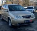 Бежевый Киа Каренс, объемом двигателя 1.8 л и пробегом 281 тыс. км за 4140 $, фото 2 на Automoto.ua