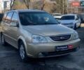 Бежевый Киа Каренс, объемом двигателя 1.8 л и пробегом 281 тыс. км за 4140 $, фото 2 на Automoto.ua