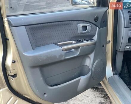 Бежевый Киа Каренс, объемом двигателя 1.8 л и пробегом 281 тыс. км за 4140 $, фото 17 на Automoto.ua