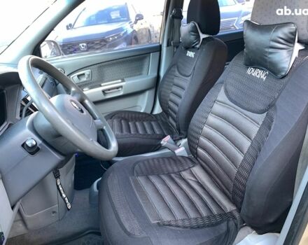 Бежевый Киа Каренс, объемом двигателя 1.8 л и пробегом 281 тыс. км за 4140 $, фото 28 на Automoto.ua