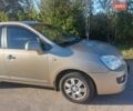 Бежевий Кіа Каренс, об'ємом двигуна 2 л та пробігом 319 тис. км за 5800 $, фото 3 на Automoto.ua