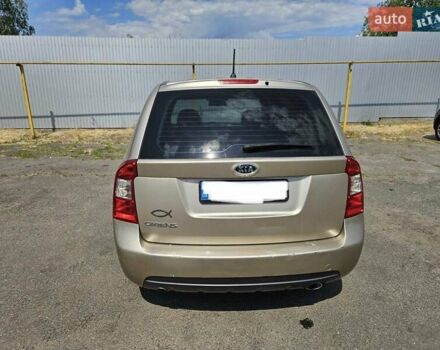 Бежевий Кіа Каренс, об'ємом двигуна 2 л та пробігом 287 тис. км за 4500 $, фото 2 на Automoto.ua