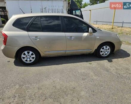 Бежевий Кіа Каренс, об'ємом двигуна 2 л та пробігом 287 тис. км за 4500 $, фото 1 на Automoto.ua