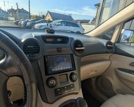 Бежевый Киа Каренс, объемом двигателя 2 л и пробегом 322 тыс. км за 5300 $, фото 10 на Automoto.ua