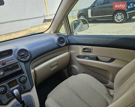 Бежевий Кіа Каренс, об'ємом двигуна 2 л та пробігом 287 тис. км за 4500 $, фото 18 на Automoto.ua