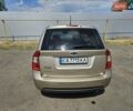 Бежевый Киа Каренс, объемом двигателя 2 л и пробегом 287 тыс. км за 4500 $, фото 16 на Automoto.ua