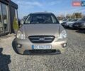 Бежевый Киа Каренс, объемом двигателя 2 л и пробегом 322 тыс. км за 5300 $, фото 1 на Automoto.ua
