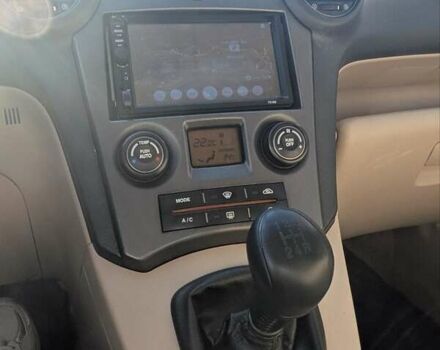 Бежевый Киа Каренс, объемом двигателя 2 л и пробегом 322 тыс. км за 5300 $, фото 16 на Automoto.ua