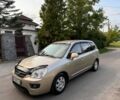 Бежевий Кіа Каренс, об'ємом двигуна 2 л та пробігом 206 тис. км за 6700 $, фото 1 на Automoto.ua