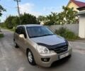 Бежевий Кіа Каренс, об'ємом двигуна 2 л та пробігом 206 тис. км за 6700 $, фото 2 на Automoto.ua
