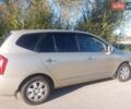 Бежевий Кіа Каренс, об'ємом двигуна 2 л та пробігом 319 тис. км за 5800 $, фото 2 на Automoto.ua