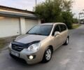 Бежевий Кіа Каренс, об'ємом двигуна 2 л та пробігом 206 тис. км за 6700 $, фото 1 на Automoto.ua