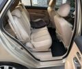 Бежевий Кіа Каренс, об'ємом двигуна 2 л та пробігом 206 тис. км за 6700 $, фото 6 на Automoto.ua