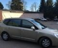 Бежевий Кіа Каренс, об'ємом двигуна 2 л та пробігом 237 тис. км за 5650 $, фото 22 на Automoto.ua