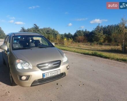 Бежевий Кіа Каренс, об'ємом двигуна 2 л та пробігом 319 тис. км за 5800 $, фото 1 на Automoto.ua