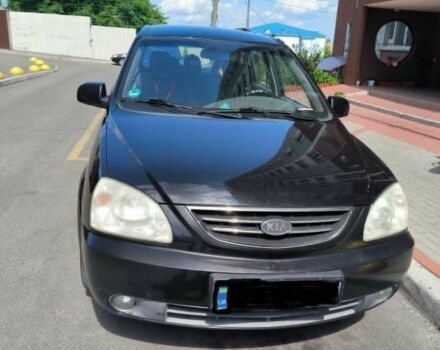 Черный Киа Каренс, объемом двигателя 1.8 л и пробегом 290 тыс. км за 3940 $, фото 2 на Automoto.ua