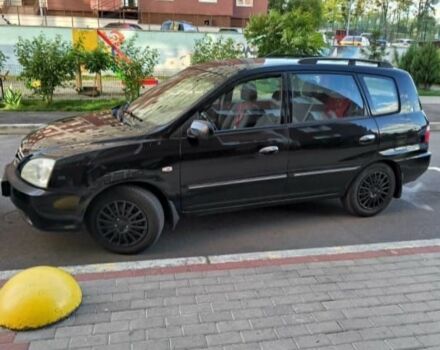 Черный Киа Каренс, объемом двигателя 1.8 л и пробегом 290 тыс. км за 3940 $, фото 3 на Automoto.ua