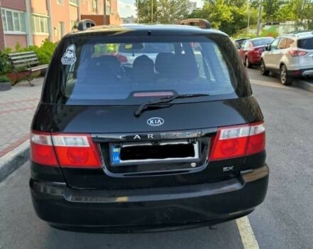 Черный Киа Каренс, объемом двигателя 1.8 л и пробегом 290 тыс. км за 3940 $, фото 4 на Automoto.ua