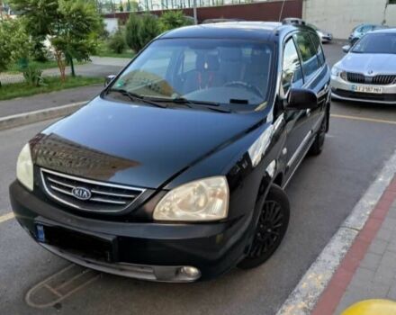 Черный Киа Каренс, объемом двигателя 1.8 л и пробегом 290 тыс. км за 3940 $, фото 1 на Automoto.ua