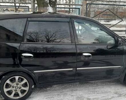 Черный Киа Каренс, объемом двигателя 2 л и пробегом 330 тыс. км за 4500 $, фото 4 на Automoto.ua