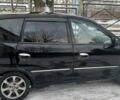 Черный Киа Каренс, объемом двигателя 2 л и пробегом 330 тыс. км за 4500 $, фото 4 на Automoto.ua