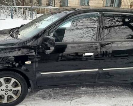 Черный Киа Каренс, объемом двигателя 2 л и пробегом 330 тыс. км за 4500 $, фото 5 на Automoto.ua