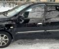 Черный Киа Каренс, объемом двигателя 2 л и пробегом 330 тыс. км за 4500 $, фото 1 на Automoto.ua