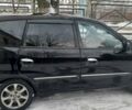 Черный Киа Каренс, объемом двигателя 2 л и пробегом 330 тыс. км за 4500 $, фото 4 на Automoto.ua