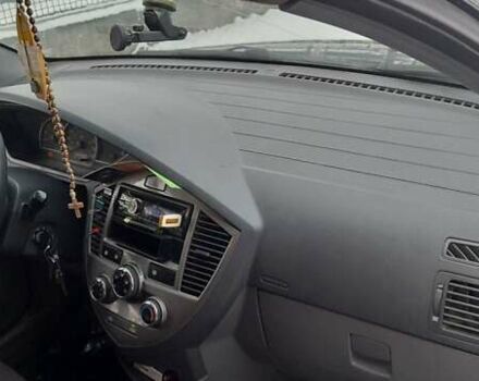 Черный Киа Каренс, объемом двигателя 2 л и пробегом 330 тыс. км за 4500 $, фото 6 на Automoto.ua