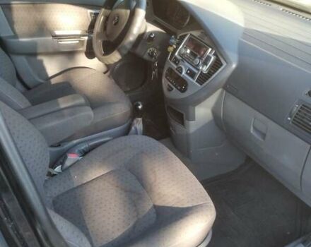 Черный Киа Каренс, объемом двигателя 2 л и пробегом 320 тыс. км за 5830 $, фото 20 на Automoto.ua